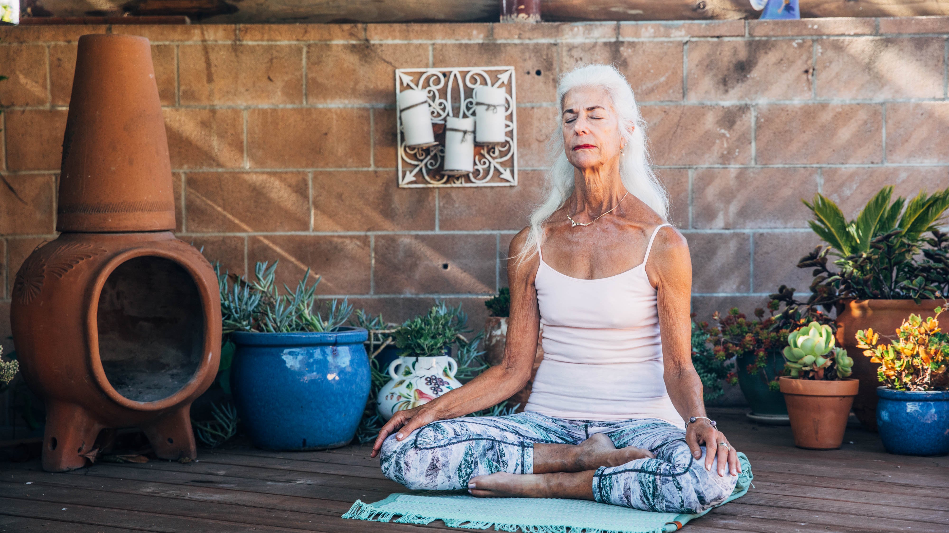 woman sitting in meditation